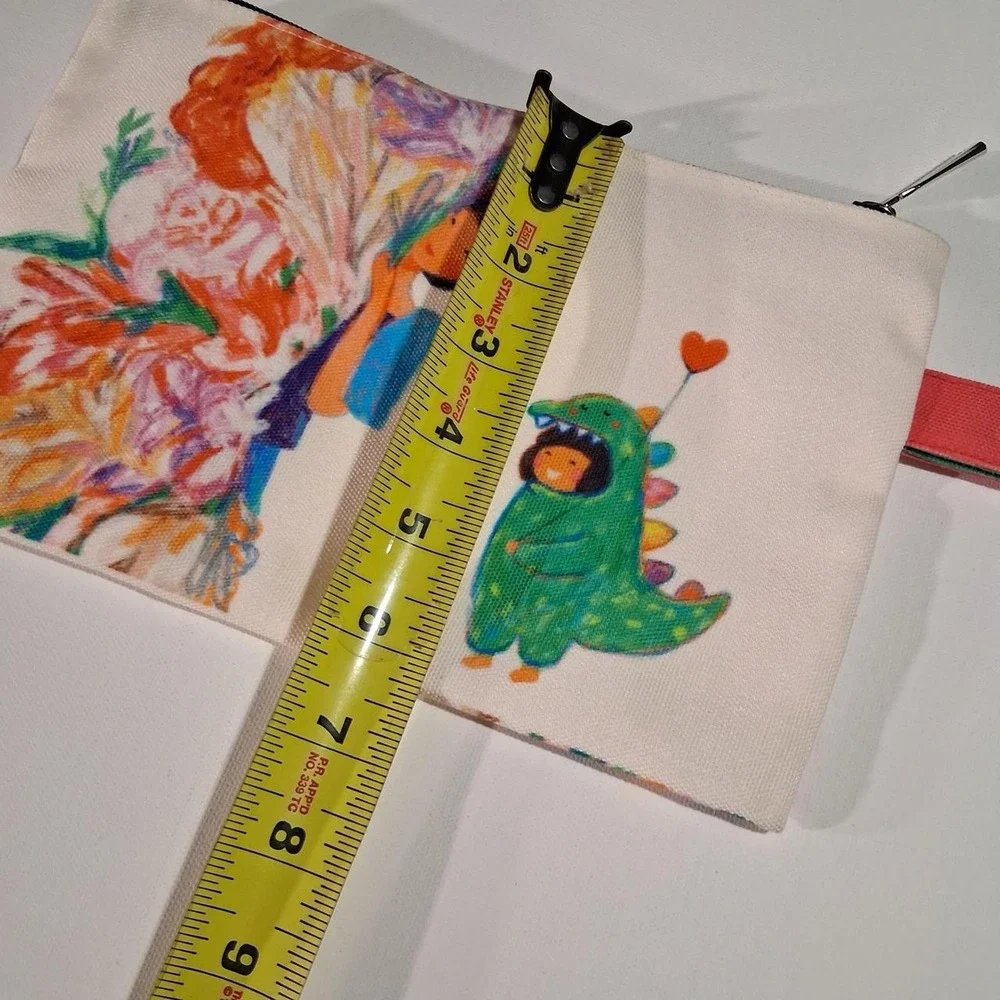 Womens Phillipines canvas pouch with graphic of a girl with a green dinosaur